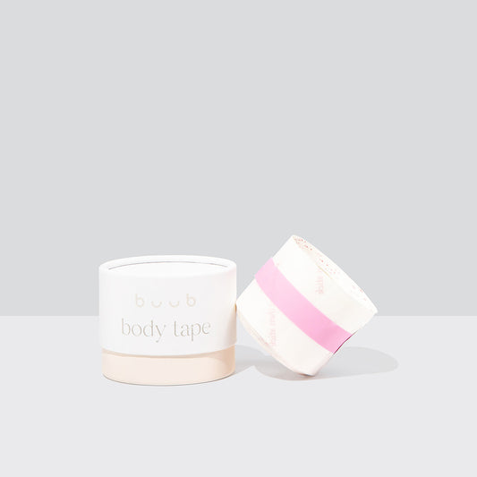 Buub Clear Body Tape, a transparent breast tape option for any outfit. The standard width roll is shown next to the modern white and beige 'buub' box.